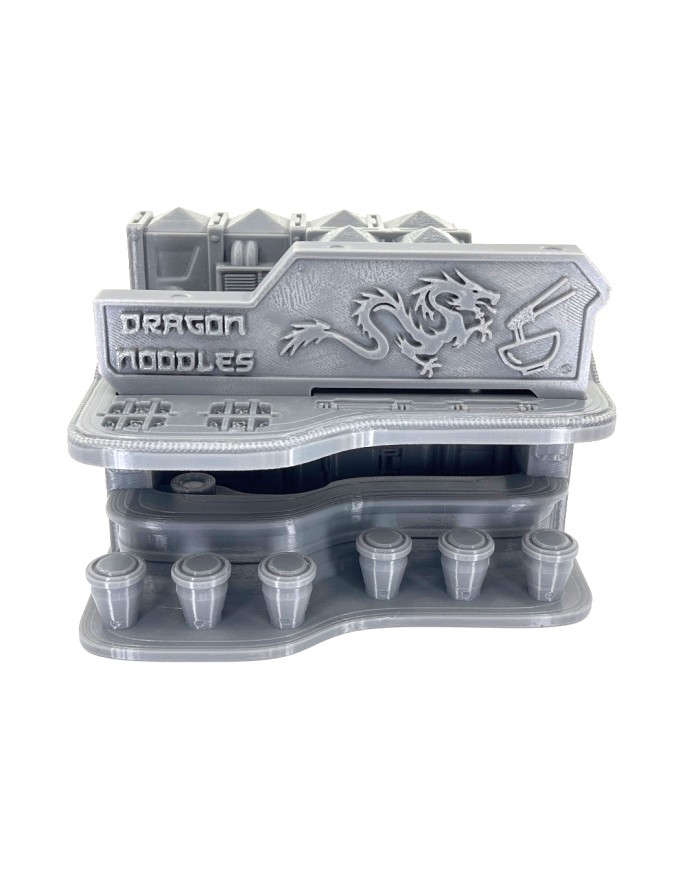 Bar Dragon Noodles|Edificios Ciberpunk|De la colección City-8, diseñada por DecoQuest Workshop™.
Disponible en escalas de 28mm y 32mm. 
Todos los elementos vienen sin pintar y es posible que se requiera algún montaje.
Las miniaturas no están incluidas y son usadas únicamente como referencia de escala. 
Inspeccionamos todos nuestros productos antes del envío, pero debido a la naturaleza de la impresión 3D, algunos objetos pueden requerir una limpieza antes de su uso.
Otras resoluciones de impresión (calidad de impresión) y escala (tamaño) están disponibles según se solicite.
Terrain And Minis es un impresor autorizado con licencia comercial de DecoQuest Workshop™.