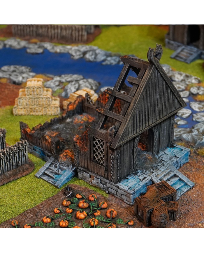 Kingdom of Saxonia - The Warrior's Home Ruined|Conquest Creations|The Warrior's Home Ruined is an ideal piece of terrrain for any miniatures gaming enthusiast, especially if you're looking for historical and medieval settings. Inspired by the traditional architecture of the Kingdom of Saxonia , this construction brings an authentic and detailed touch to your games.

Designed by Conquest Creations , this terrain stands out for its great realism and the ease with which it can be integrated into any gaming table.

This Warrior's Home Ruined has been carefully crafted to offer an immersive experience. Its walls, roof, and details are designed to recreate daily life in the Kingdom of Saxonia , making it a versatile piece for both collectors and wargamers.

In addition, it is fully compatible with the popular MESBG (Middle-Earth Strategy Battle Game) gaming system, so you can use it to recreate epic battles or custom narratives.

This article is not a House of Rohan Ruined from the MESBG game and is not supported or endorsed in any way by Games Workshop.

House of Rohan Ruined from the MESBG game can be purchased at warhammer.com

In the War of the Rohirrim it was very common to find some house of Rohan Ruined

Whether you're looking to enhance your tournament scenery or simply liven up your collection, the Warrior's Home Ruined is a must-have addition.

Its high-quality design and historical theme of the Kingdom of Saxonia will give your games a unique sense of realism.

With Conquest Creations , authenticity and detail are guaranteed.

All elements come unpainted and assembly is required.

We inspect all our products before shipping, but due to the nature of 3D printing, some objects may require cleaning before use.

Other print resolutions (print quality) and scales (size) are available upon request.

Terrain And Minis is an authorized commercially licensed printer of Conquest Creations
